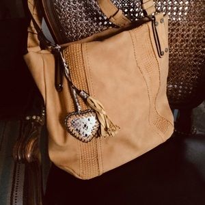 Fun bag for every day. Heart & Tassel adds flare.